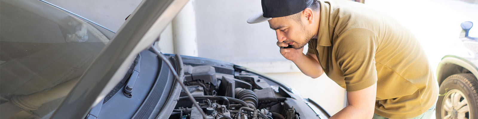 Mechanic working on car